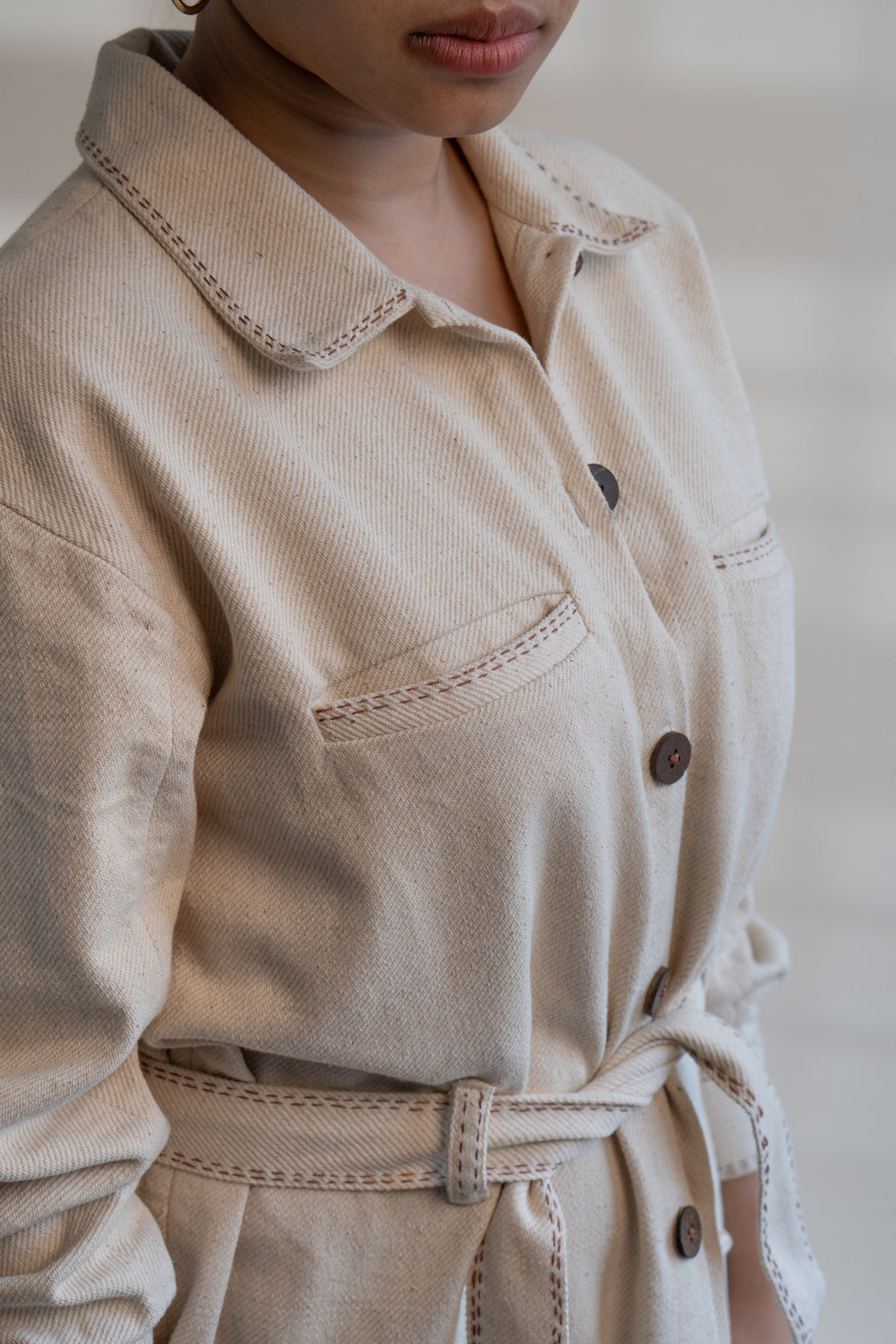 Dawning Denim Dress at Kamakhyaa by Lafaani. This item is Beige, Casual Wear, Denim, Embroidered, Hand Woven Cotton, Kora, Natural, Regular Fit, Shirt Dresses, Shirts, Womenswear