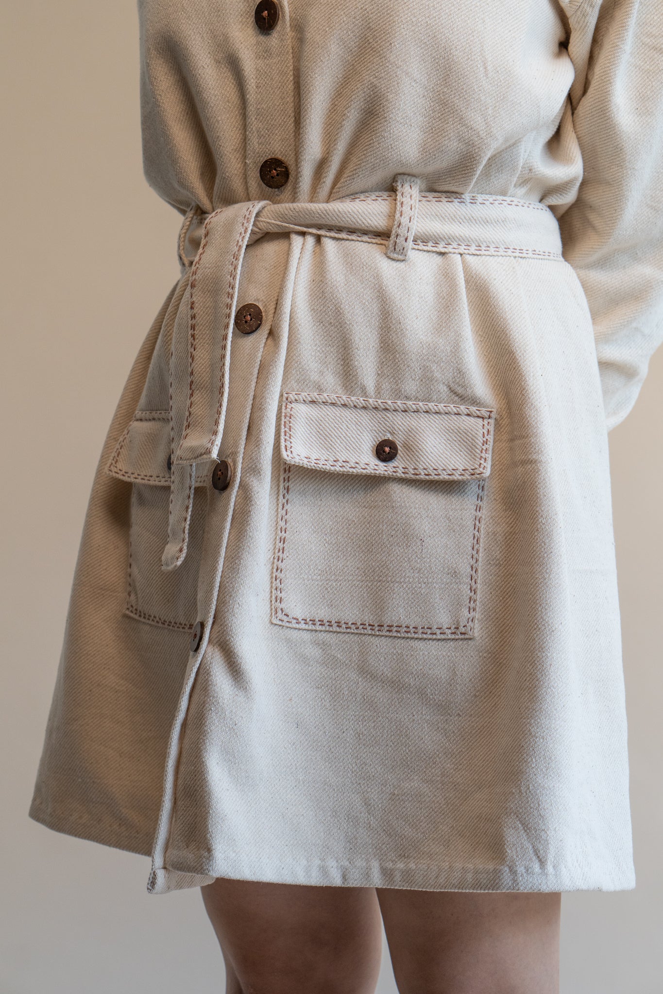 Dawning Denim Dress at Kamakhyaa by Lafaani. This item is Beige, Casual Wear, Denim, Embroidered, Hand Woven Cotton, Kora, Natural, Regular Fit, Shirt Dresses, Shirts, Womenswear