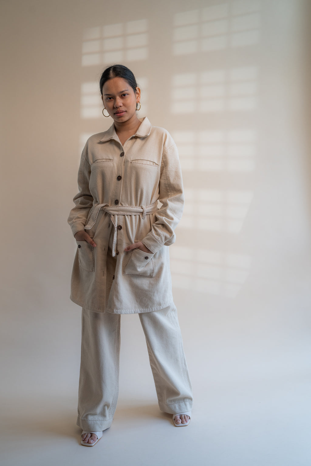 Dawning Denim Dress & Patch Pocket Pants Set at Kamakhyaa by Lafaani. This item is Beige, Casual Wear, Co-ord Sets, Denim, Embroidered, Hand Woven Cotton, Kora, Natural, Regular Fit, Vacation, Vacation Co-ords, Womenswear