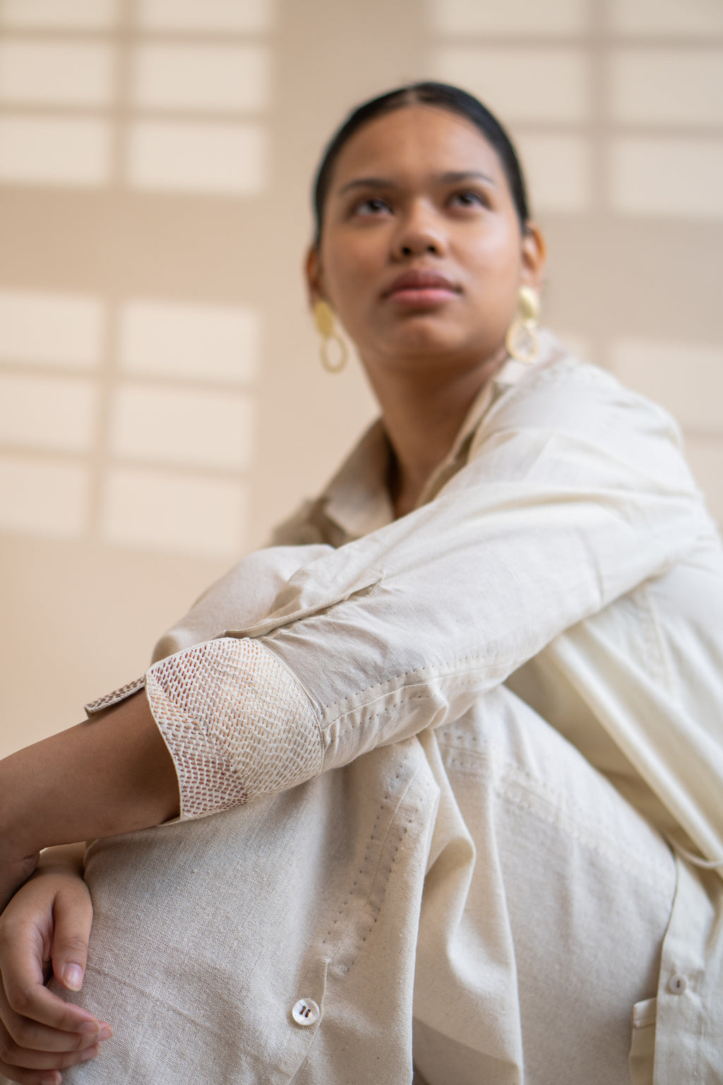 Dawning Draped Shirt at Kamakhyaa by Lafaani. This item is Beige, Casual Wear, Denim, Embroidered, Hand Woven Cotton, Kora, Natural, Relaxed Fit, Tops, Womenswear, Wrap Tops