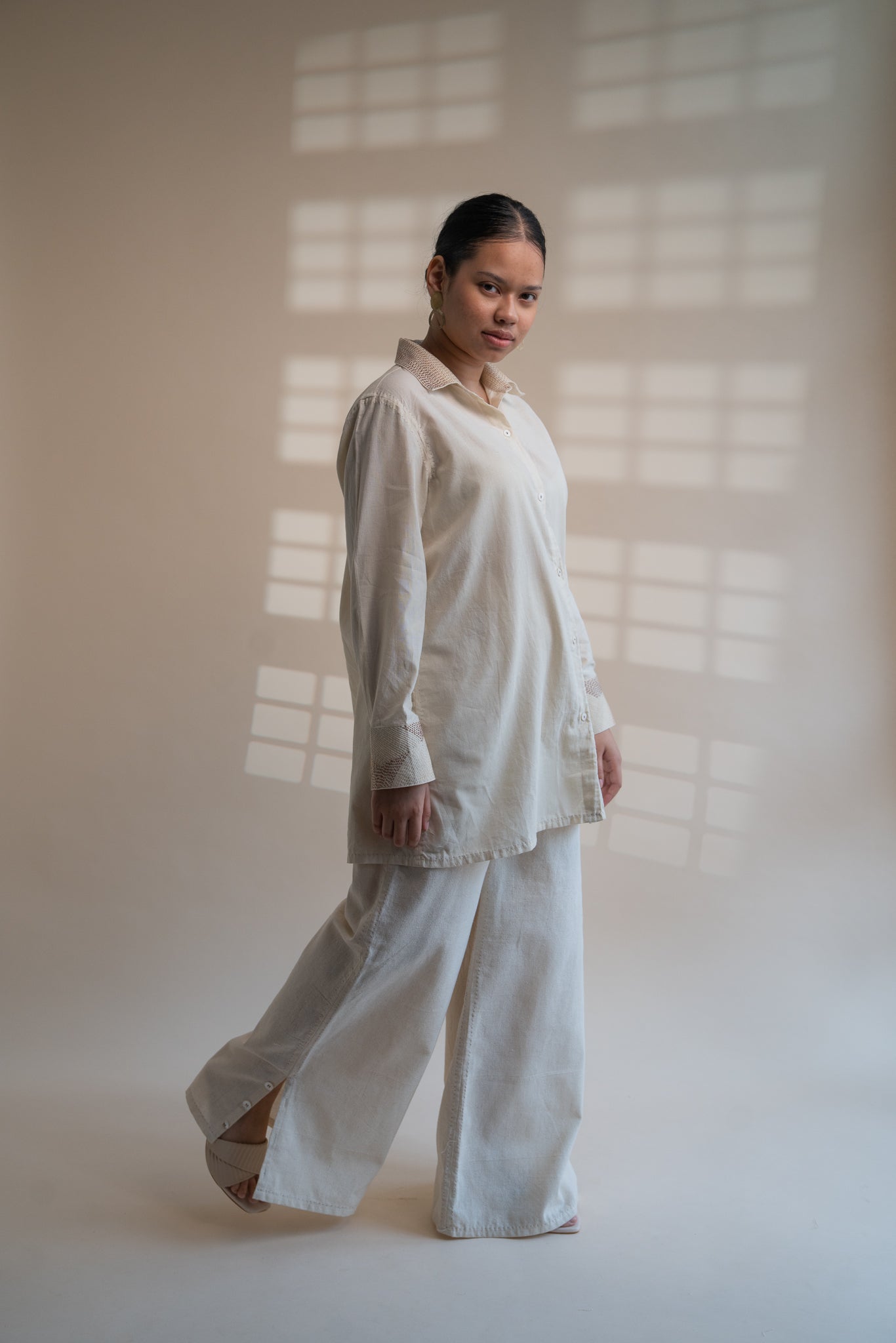 Dawning Draped Shirt at Kamakhyaa by Lafaani. This item is Beige, Casual Wear, Denim, Embroidered, Hand Woven Cotton, Kora, Natural, Relaxed Fit, Tops, Womenswear, Wrap Tops