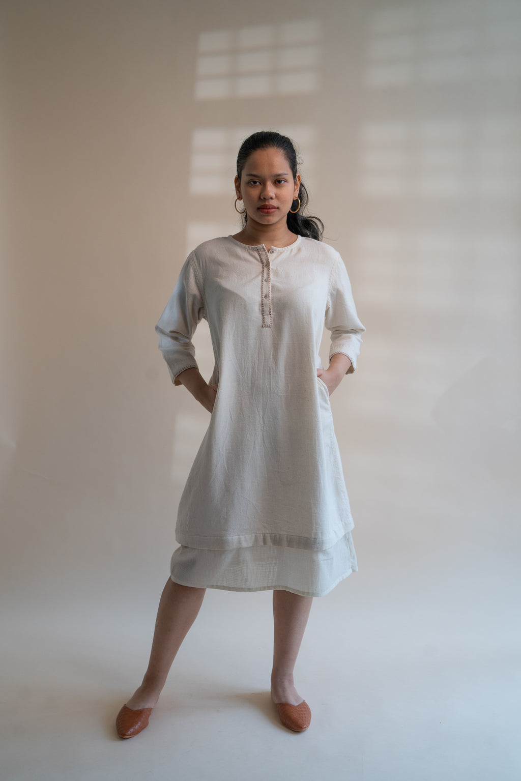 Dawning Long Shirt at Kamakhyaa by Lafaani. This item is Beige, Casual Wear, Denim, Embroidered, Hand Woven Cotton, Kora, Natural, Regular Fit, Shirt Dresses, Shirts, Womenswear