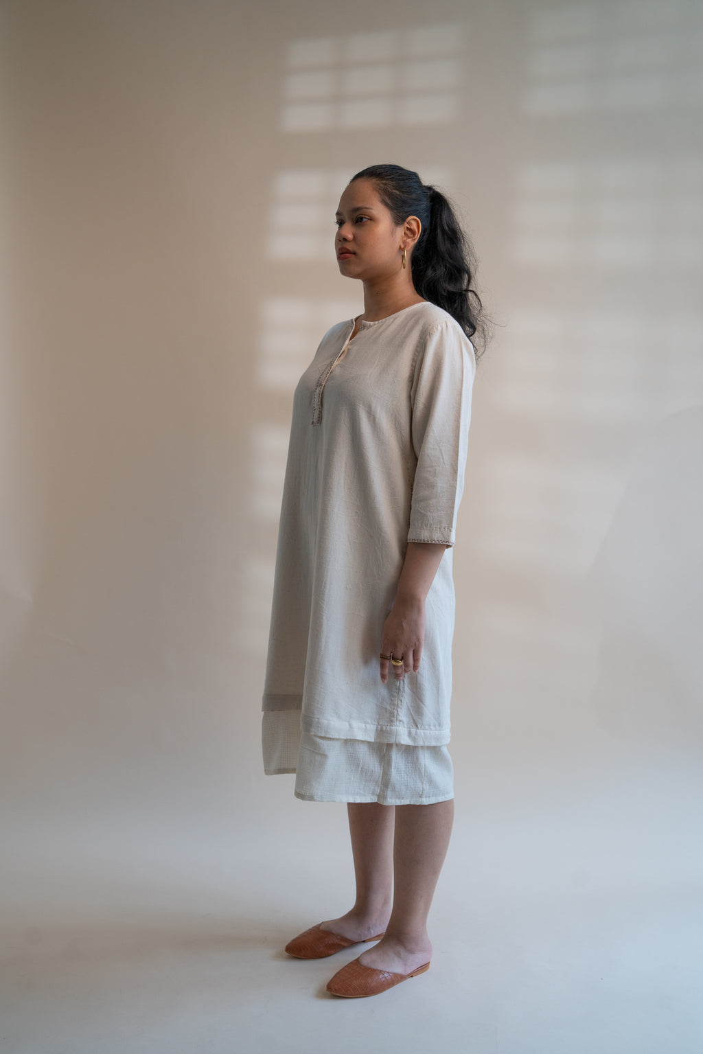Dawning Long Shirt at Kamakhyaa by Lafaani. This item is Beige, Casual Wear, Denim, Embroidered, Hand Woven Cotton, Kora, Natural, Regular Fit, Shirt Dresses, Shirts, Womenswear