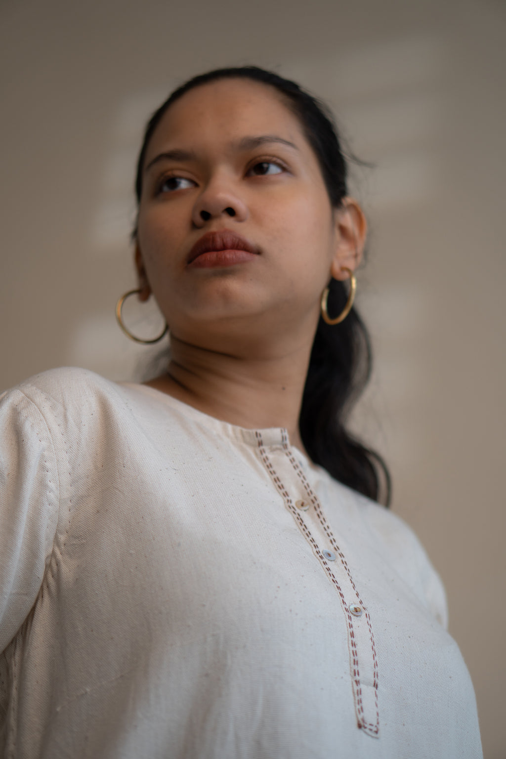 Dawning Long Shirt at Kamakhyaa by Lafaani. This item is Beige, Casual Wear, Denim, Embroidered, Hand Woven Cotton, Kora, Natural, Regular Fit, Shirt Dresses, Shirts, Womenswear