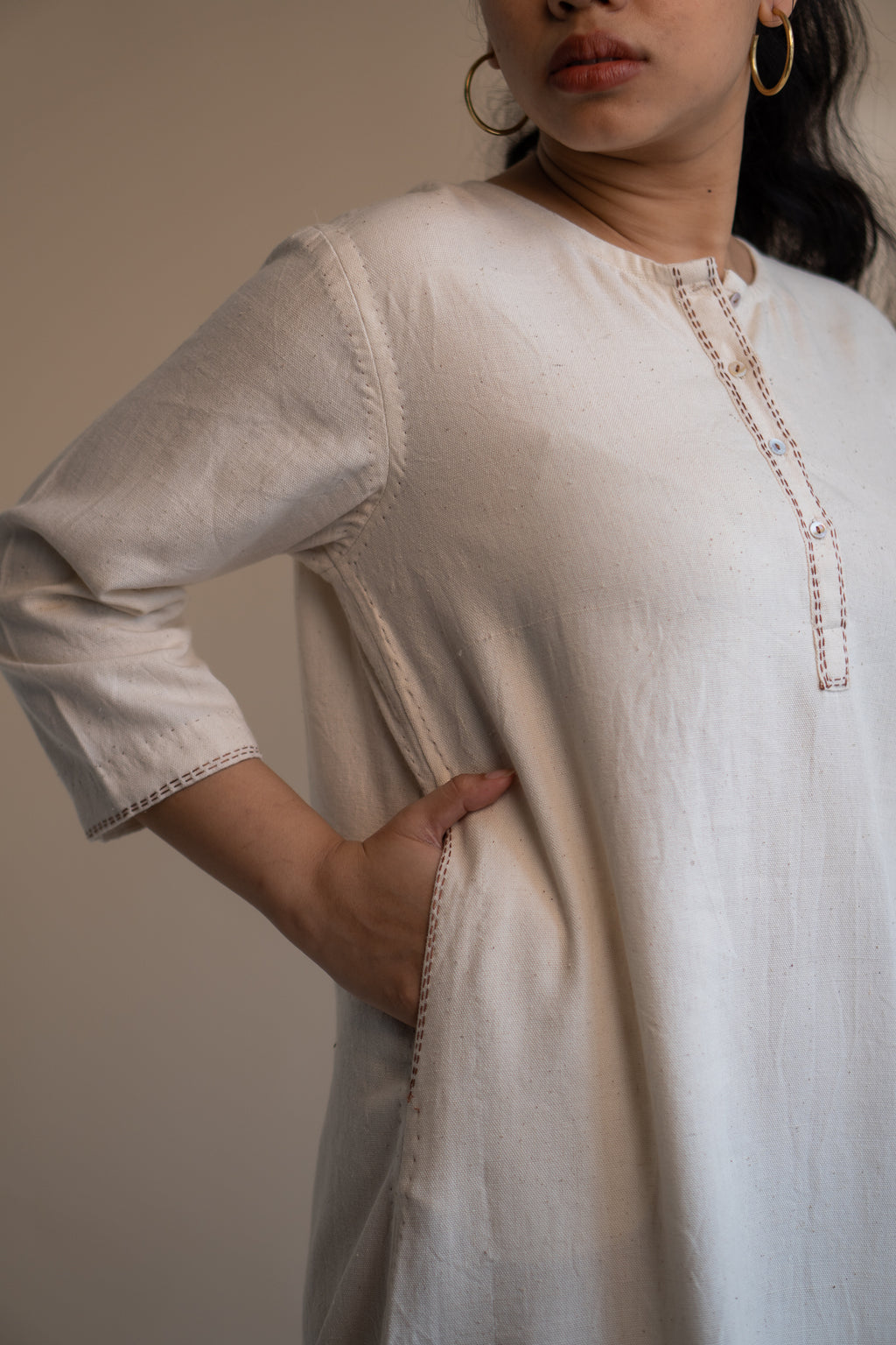 Dawning Long Shirt at Kamakhyaa by Lafaani. This item is Beige, Casual Wear, Denim, Embroidered, Hand Woven Cotton, Kora, Natural, Regular Fit, Shirt Dresses, Shirts, Womenswear