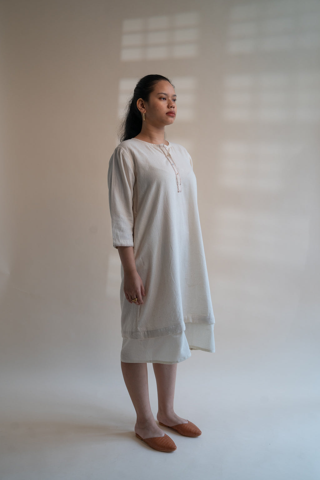 Dawning Long Shirt at Kamakhyaa by Lafaani. This item is Beige, Casual Wear, Denim, Embroidered, Hand Woven Cotton, Kora, Natural, Regular Fit, Shirt Dresses, Shirts, Womenswear