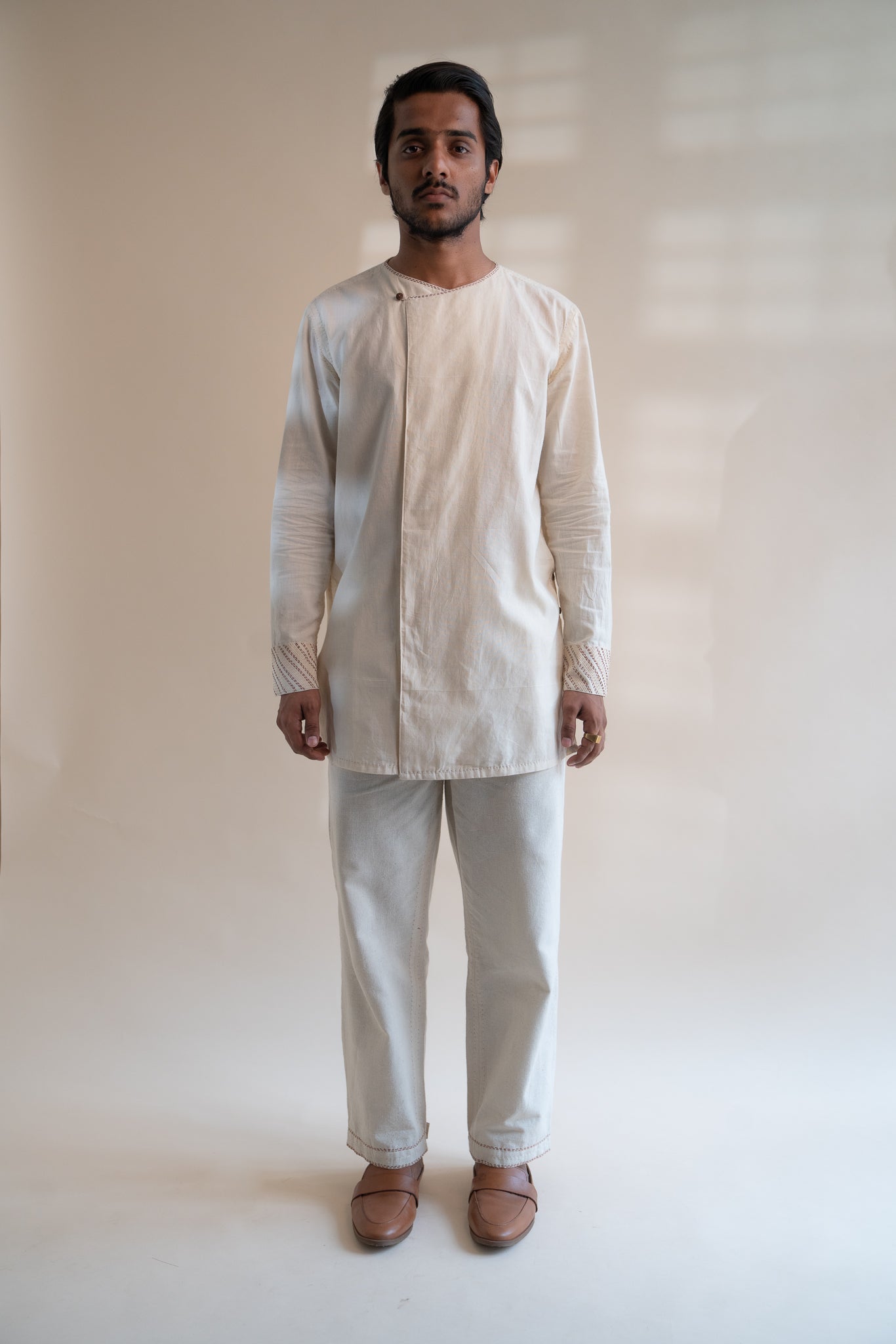 Dawning Pleated Pants at kamakhyaa.com by Lafaani. This item is 100% Cotton, Beige, Casual Wear, Clothing by Lafaani, Dawning by Lafaani, Denim, Embroidered, For Father, For Him, Handwoven Cotton, Kora, Men Shirts, Menswear, Natural, Rakhi Special, Regular Fit, Shirts, Tops, Under $200
