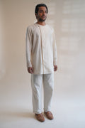 Dawning Pleated Pants at kamakhyaa.com by Lafaani. This item is 100% Cotton, Beige, Casual Wear, Clothing by Lafaani, Dawning by Lafaani, Denim, Embroidered, For Father, For Him, Handwoven Cotton, Kora, Men Shirts, Menswear, Natural, Rakhi Special, Regular Fit, Shirts, Tops, Under $200