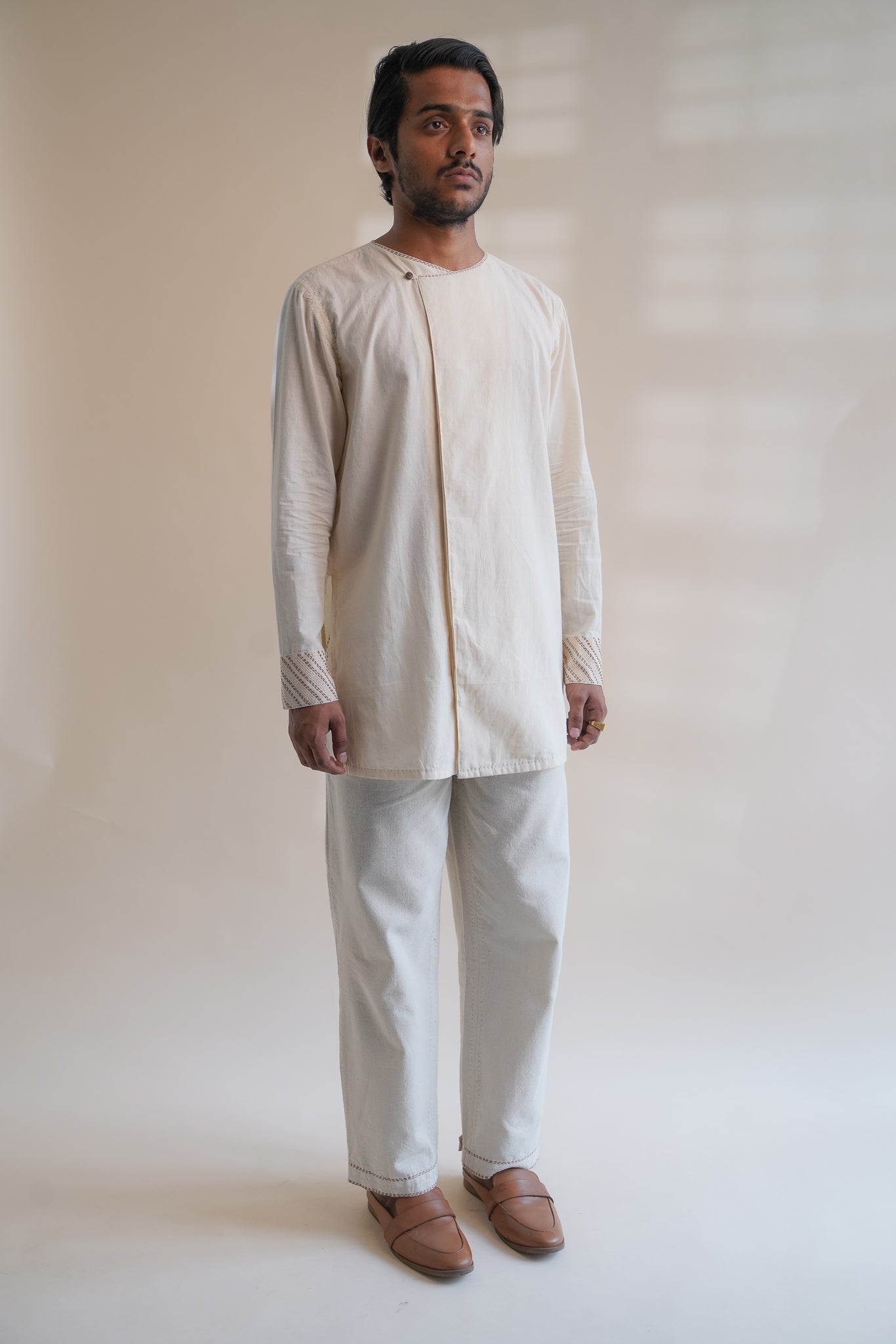 Dawning Pleated Pants at kamakhyaa.com by Lafaani. This item is 100% Cotton, Beige, Casual Wear, Clothing by Lafaani, Dawning by Lafaani, Denim, Embroidered, For Father, For Him, Handwoven Cotton, Kora, Men Shirts, Menswear, Natural, Rakhi Special, Regular Fit, Shirts, Tops, Under $200