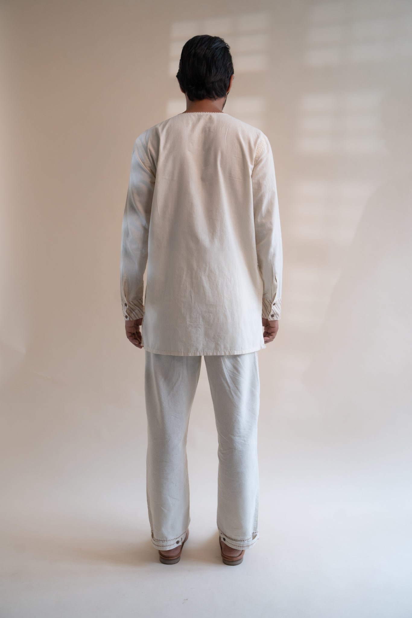 Dawning Pleated Pants at kamakhyaa.com by Lafaani. This item is 100% Cotton, Beige, Casual Wear, Clothing by Lafaani, Dawning by Lafaani, Denim, Embroidered, For Father, For Him, Handwoven Cotton, Kora, Men Shirts, Menswear, Natural, Rakhi Special, Regular Fit, Shirts, Tops, Under $200