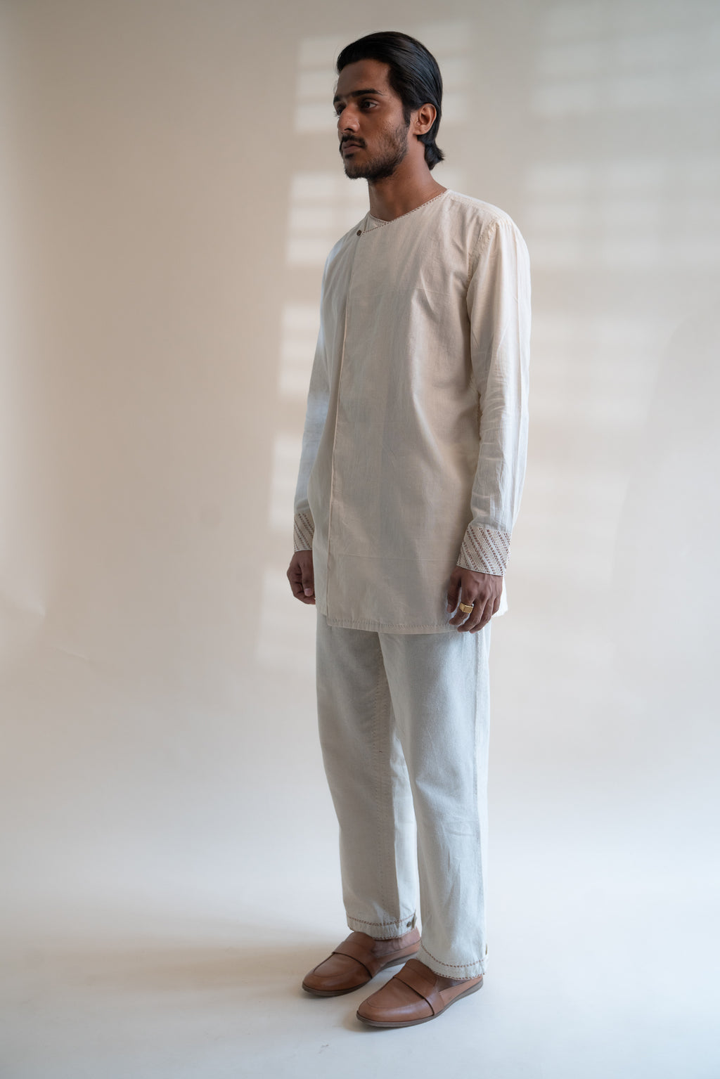 Dawning Pleated Pants at kamakhyaa.com by Lafaani. This item is 100% Cotton, Beige, Casual Wear, Clothing by Lafaani, Dawning by Lafaani, Denim, Embroidered, For Father, For Him, Handwoven Cotton, Kora, Men Shirts, Menswear, Natural, Rakhi Special, Regular Fit, Shirts, Tops, Under $200