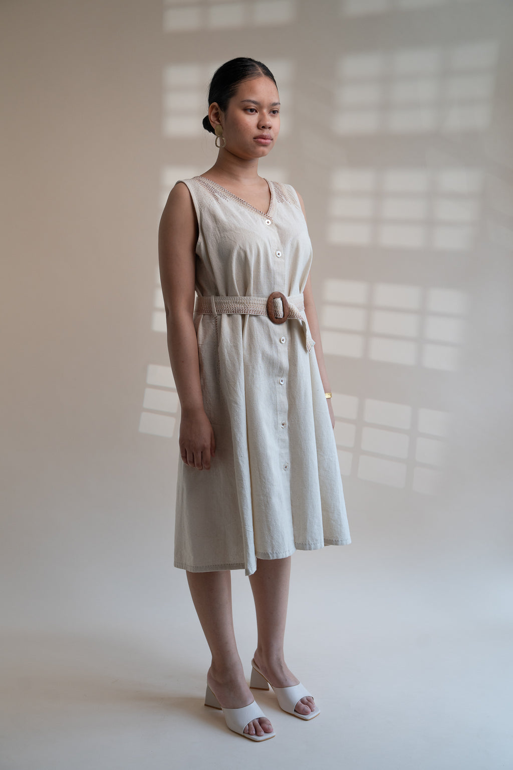 Dawning Trench Dress at Kamakhyaa by Lafaani. This item is Beige, Casual Wear, Denim, Embroidered, Hand Woven Cotton, Kora, Midi Dresses, Natural, Regular Fit, Sleeveless Dresses, Womenswear