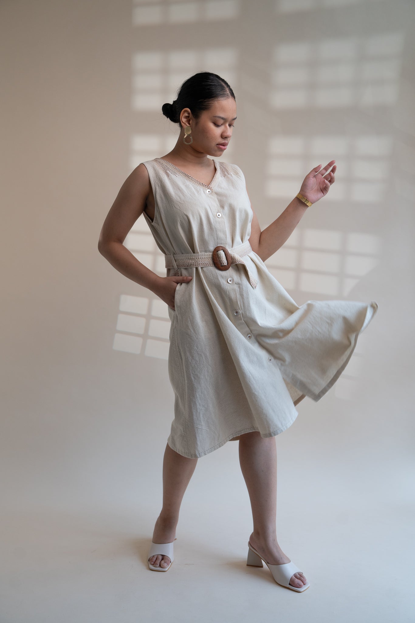Dawning Trench Dress at Kamakhyaa by Lafaani. This item is Beige, Casual Wear, Denim, Embroidered, Hand Woven Cotton, Kora, Midi Dresses, Natural, Regular Fit, Sleeveless Dresses, Womenswear