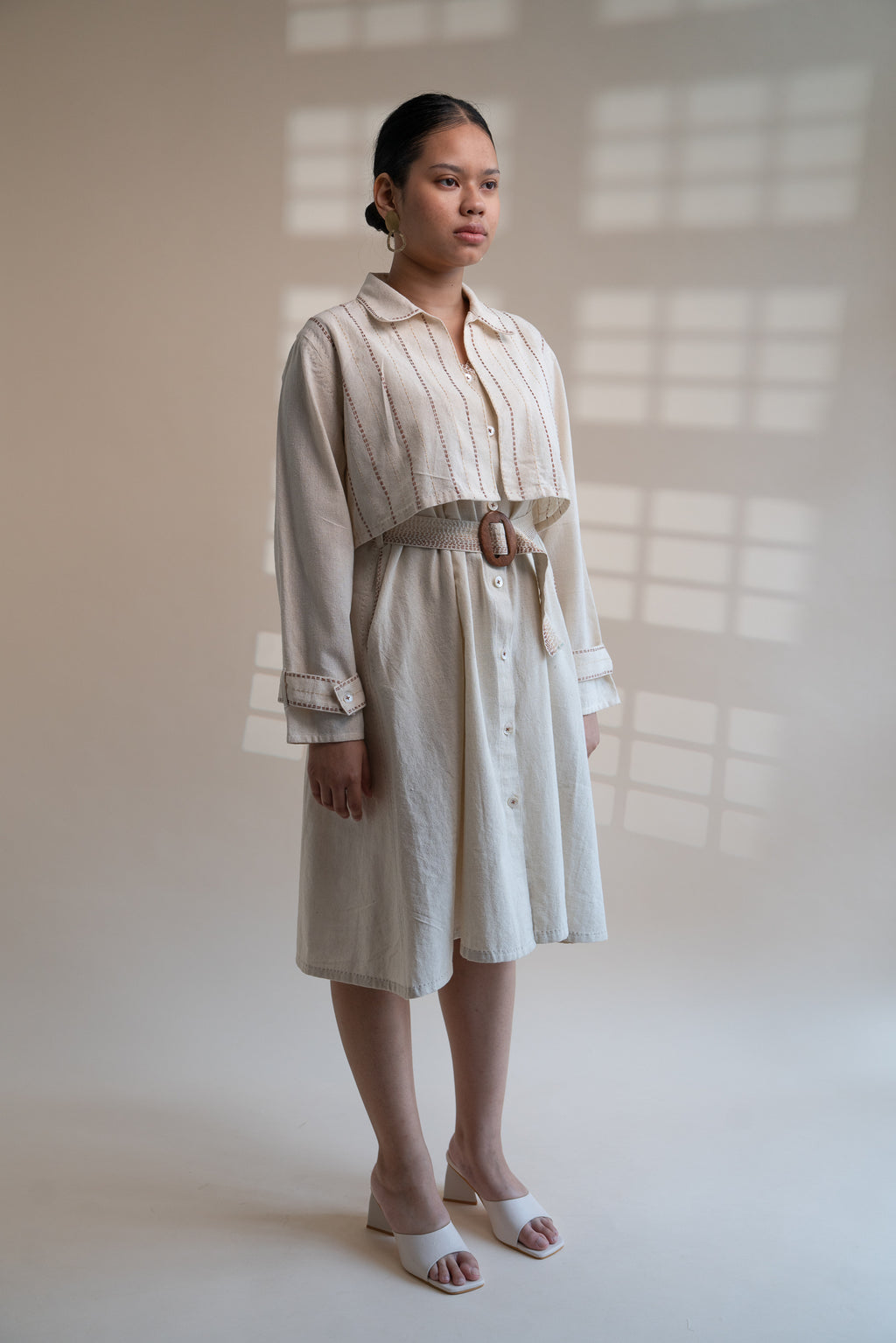 Dawning Trench Dress with Cropped Jacket at Kamakhyaa by Lafaani. This item is Beige, Casual Wear, Co-ord Sets, Denim, Embroidered, Hand Woven Cotton, Kora, Natural, Regular Fit, Vacation, Vacation Co-ords, Womenswear