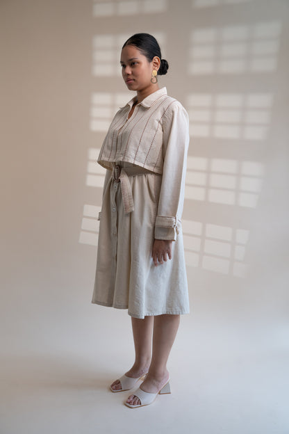 Dawning Trench Dress with Cropped Jacket at Kamakhyaa by Lafaani. This item is Beige, Casual Wear, Co-ord Sets, Denim, Embroidered, Hand Woven Cotton, Kora, Natural, Regular Fit, Vacation, Vacation Co-ords, Womenswear