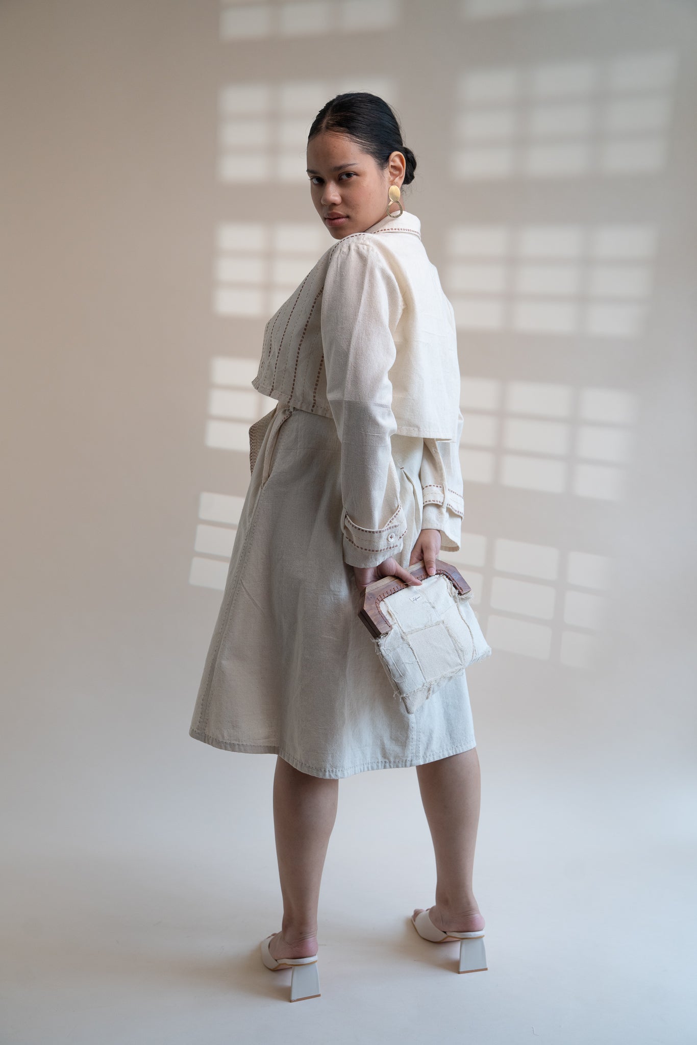 Dawning Trench Dress with Cropped Jacket at Kamakhyaa by Lafaani. This item is Beige, Casual Wear, Co-ord Sets, Denim, Embroidered, Hand Woven Cotton, Kora, Natural, Regular Fit, Vacation, Vacation Co-ords, Womenswear