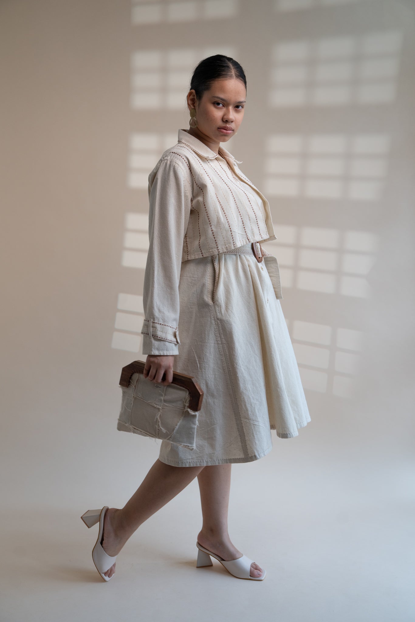 Dawning Trench Dress with Cropped Jacket at Kamakhyaa by Lafaani. This item is Beige, Casual Wear, Co-ord Sets, Denim, Embroidered, Hand Woven Cotton, Kora, Natural, Regular Fit, Vacation, Vacation Co-ords, Womenswear