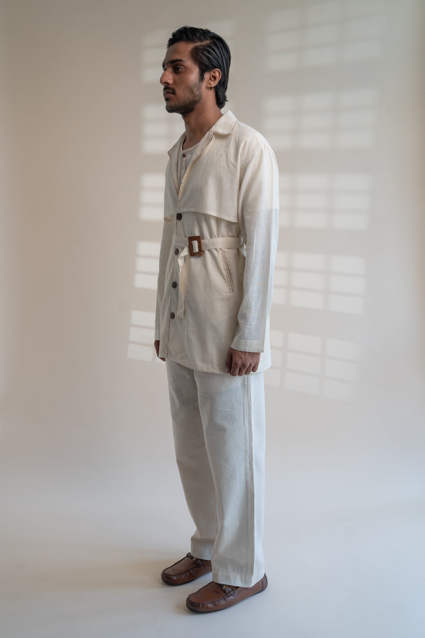 Dawning Trench Overlay at Kamakhyaa by Lafaani. This item is Beige, Casual Wear, Denim, Embroidered, For Him, Hand Woven Cotton, Kora, Mens Overlay, Menswear, Natural, Regular Fit, Trench Coats