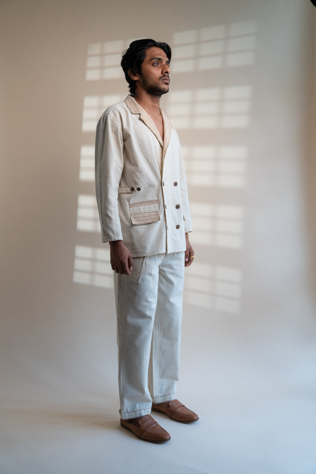 Dawning Unisex Double Breasted Jacket at Kamakhyaa by Lafaani. This item is Beige, Casual Wear, Denim, Embroidered, For Him, Hand Woven Cotton, Jackets, Kora, Mens Overlay, Menswear, Natural, Regular Fit, Unisex