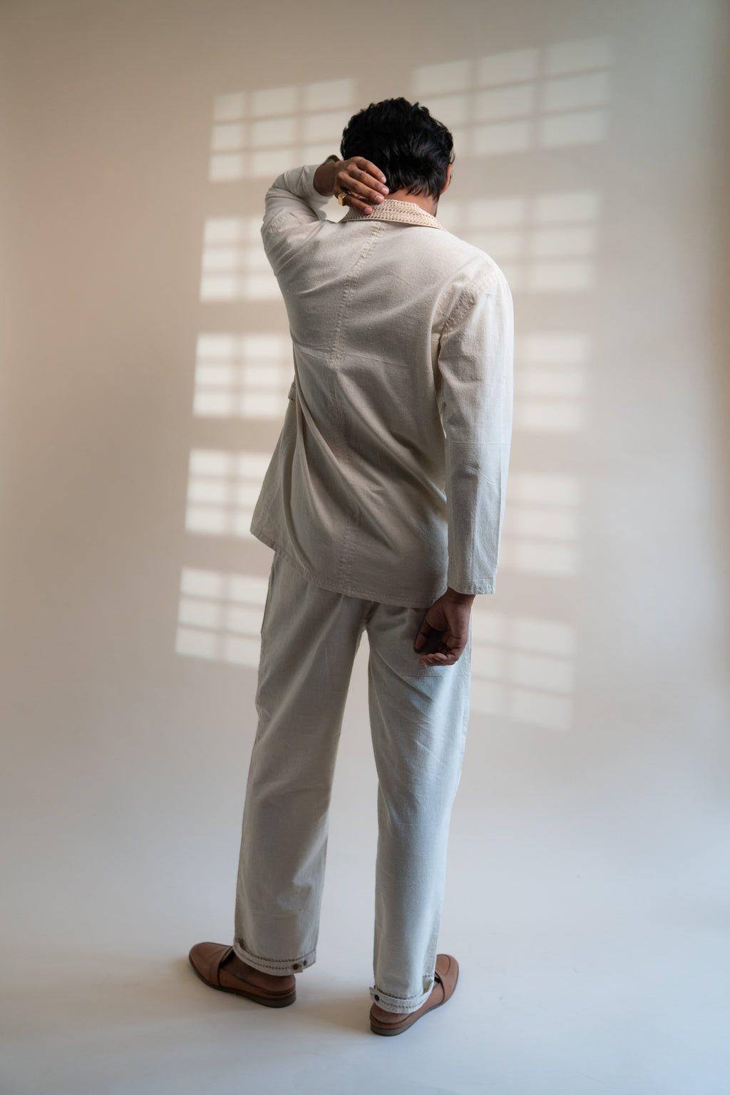 Dawning Unisex Double Breasted Jacket & Pleated Pants Set at Kamakhyaa by Lafaani. This item is Beige, Bottoms, Casual Wear, Co-ord Sets, Denim, Embroidered, For Him, Hand Woven Cotton, Kora, Mens Co-ords, Menswear, Natural, Regular Fit, Unisex