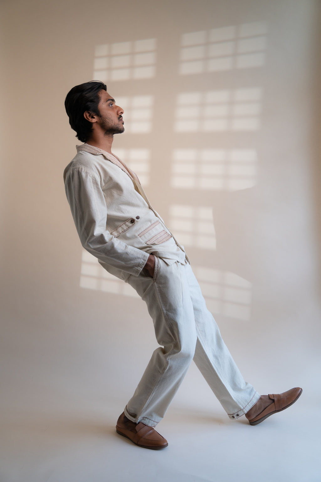 Dawning Unisex Double Breasted Jacket & Pleated Pants Set at Kamakhyaa by Lafaani. This item is Beige, Bottoms, Casual Wear, Co-ord Sets, Denim, Embroidered, For Him, Hand Woven Cotton, Kora, Mens Co-ords, Menswear, Natural, Regular Fit, Unisex