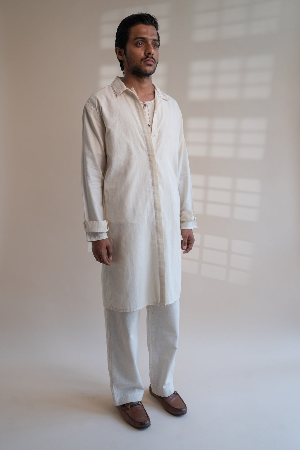 Dawning Unisex Overlay at Kamakhyaa by Lafaani. This item is Beige, Casual Wear, Denim, Embroidered, For Him, Hand Woven Cotton, Kora, Mens Overlay, Menswear, Natural, Regular Fit, Trench Coats, Unisex