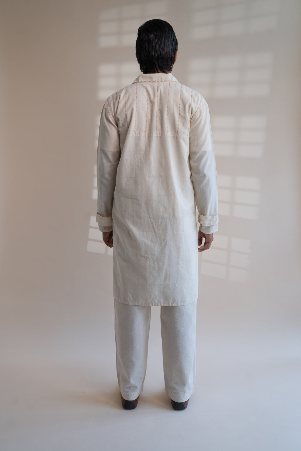 Dawning Unisex Overlay at Kamakhyaa by Lafaani. This item is Beige, Casual Wear, Denim, Embroidered, For Him, Hand Woven Cotton, Kora, Mens Overlay, Menswear, Natural, Regular Fit, Trench Coats, Unisex