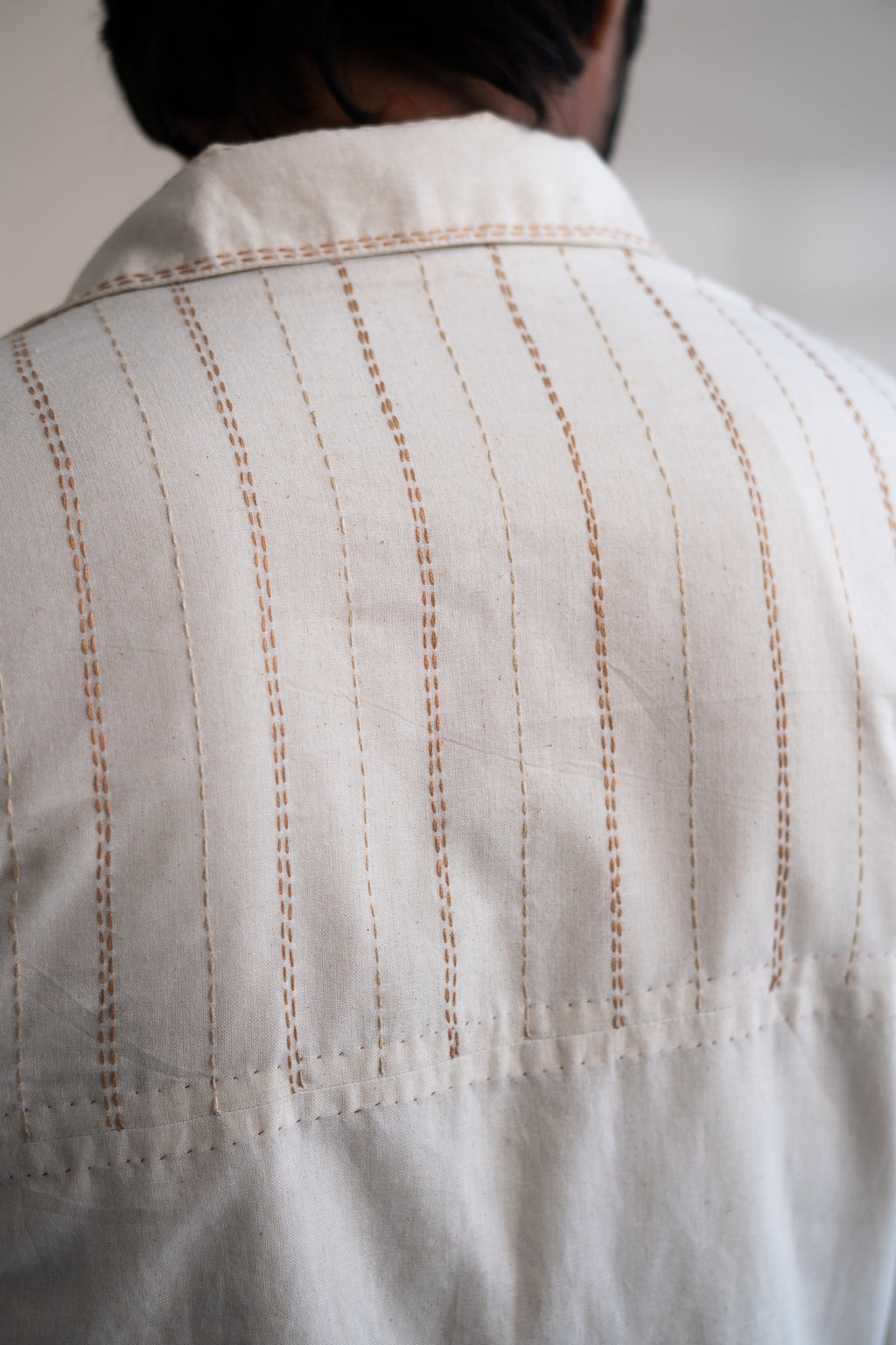 Dawning Unisex Overlay at Kamakhyaa by Lafaani. This item is Beige, Casual Wear, Denim, Embroidered, For Him, Hand Woven Cotton, Kora, Mens Overlay, Menswear, Natural, Regular Fit, Trench Coats, Unisex