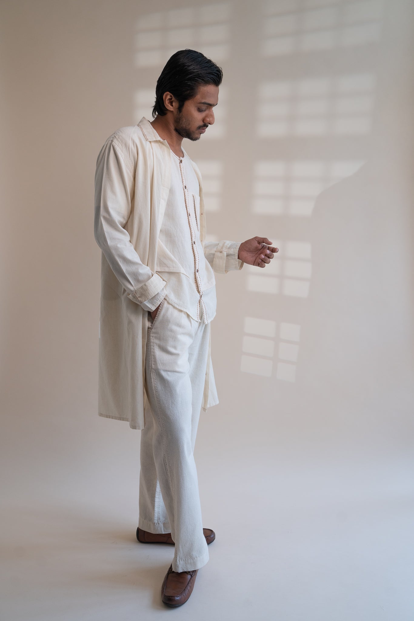 Dawning Unisex Overlay at Kamakhyaa by Lafaani. This item is Beige, Casual Wear, Denim, Embroidered, For Him, Hand Woven Cotton, Kora, Mens Overlay, Menswear, Natural, Regular Fit, Trench Coats, Unisex