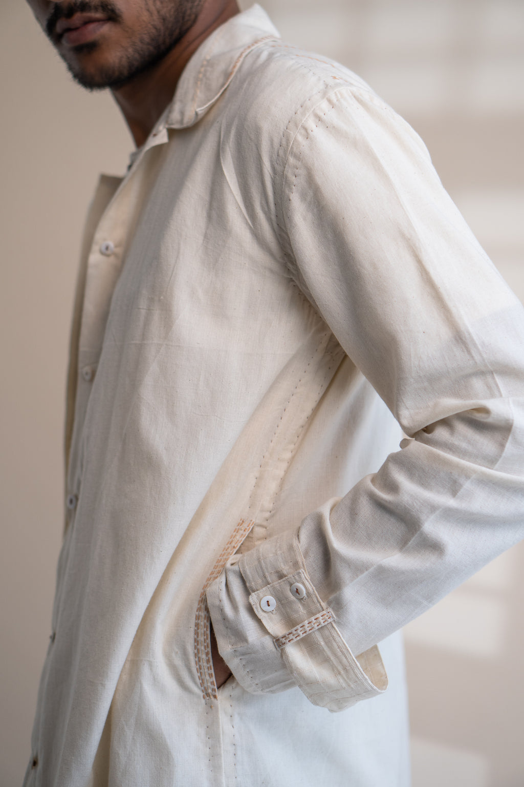 Dawning Unisex Overlay at Kamakhyaa by Lafaani. This item is Beige, Casual Wear, Denim, Embroidered, For Him, Hand Woven Cotton, Kora, Mens Overlay, Menswear, Natural, Regular Fit, Trench Coats, Unisex