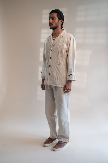 Dawning Unisex Pleated Blazer at Kamakhyaa by Lafaani. This item is Beige, Blazers, Casual Wear, Denim, Embroidered, For Him, Hand Woven Cotton, Kora, Mens Overlay, Menswear, Natural, Regular Fit, Unisex