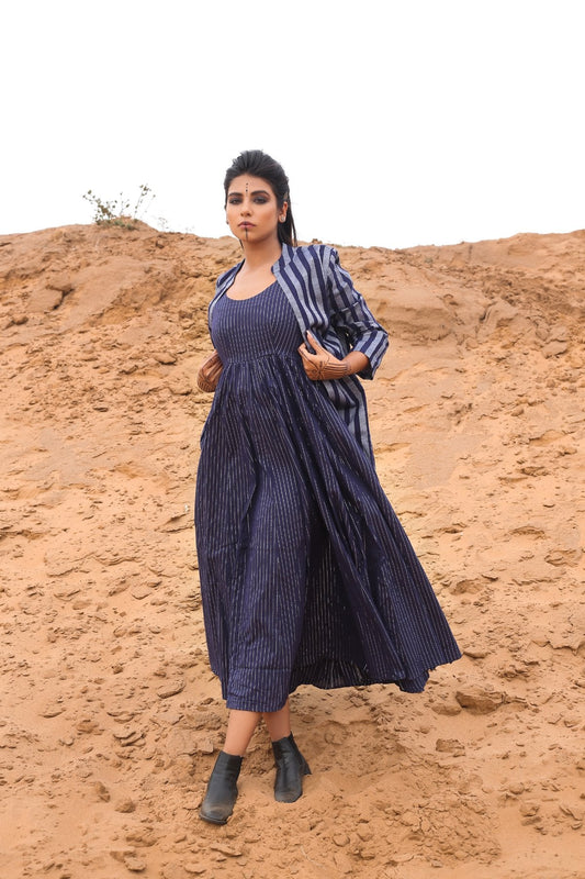 Deep Blue Striped Long Cape With Spagetti Dress - Set Of Two at Kamakhyaa by Keva. This item is Blue, Cape, Co-ord Sets, Cotton, Cotton Lurex, Desert Rose, Dress Sets, For Mother, For Mother W, Midi Dresses, Natural, Relaxed Fit, Resort Wear, Stripes, Womenswear
