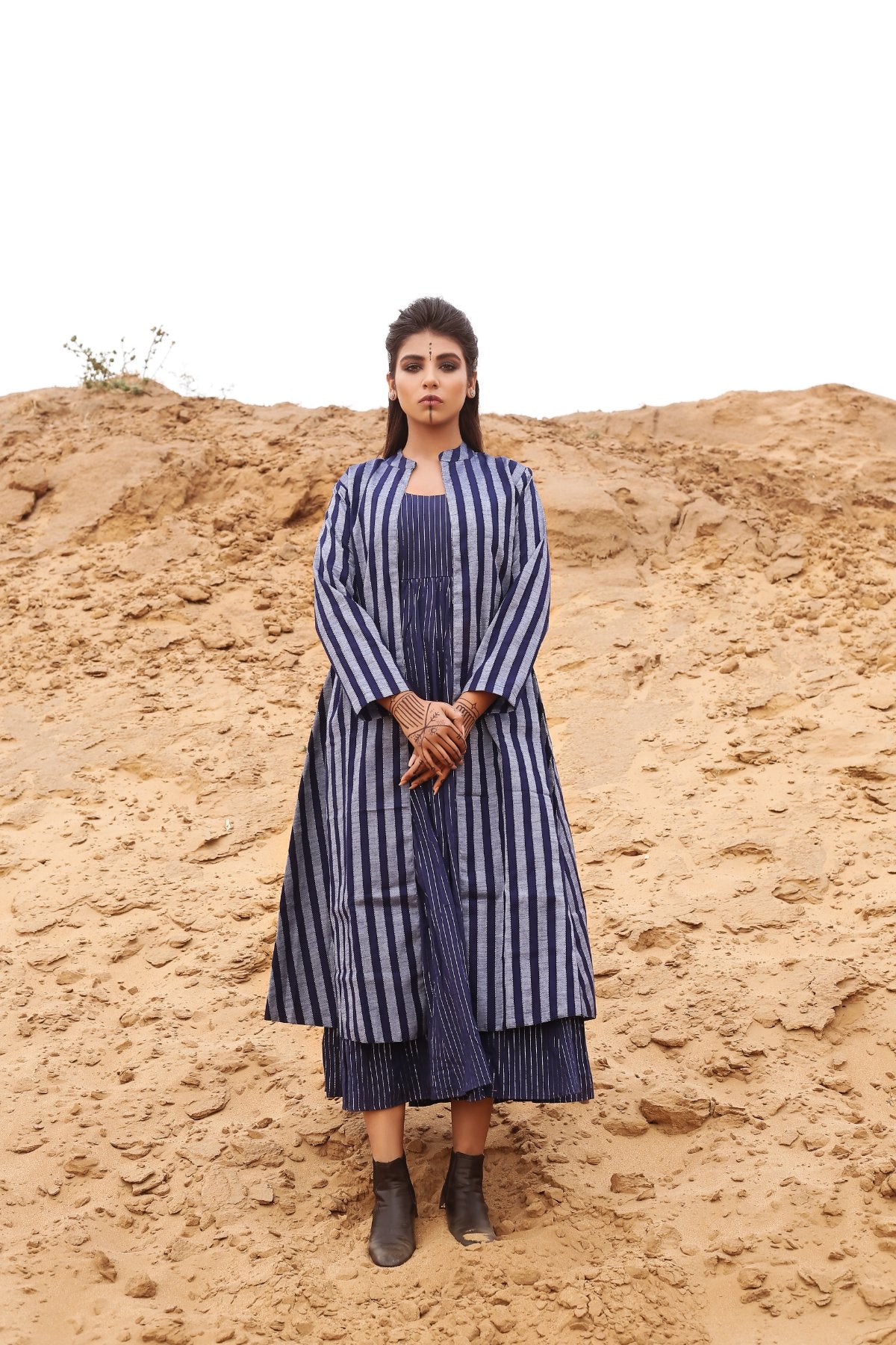 Deep Blue Striped Long Cape With Spagetti Dress - Set Of Two at Kamakhyaa by Keva. This item is Blue, Cape, Co-ord Sets, Cotton, Cotton Lurex, Desert Rose, Dress Sets, For Mother, For Mother W, Midi Dresses, Natural, Relaxed Fit, Resort Wear, Stripes, Womenswear