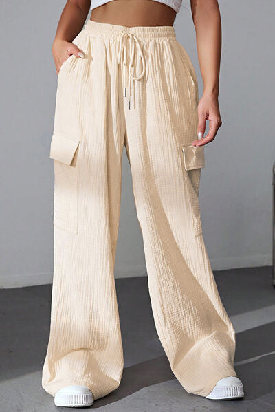 Drawstring Pocketed Wide Leg Pants at Kamakhyaa by Trendsi. This item is Ship From Overseas, SYNZ, Trendsi, Womenswear