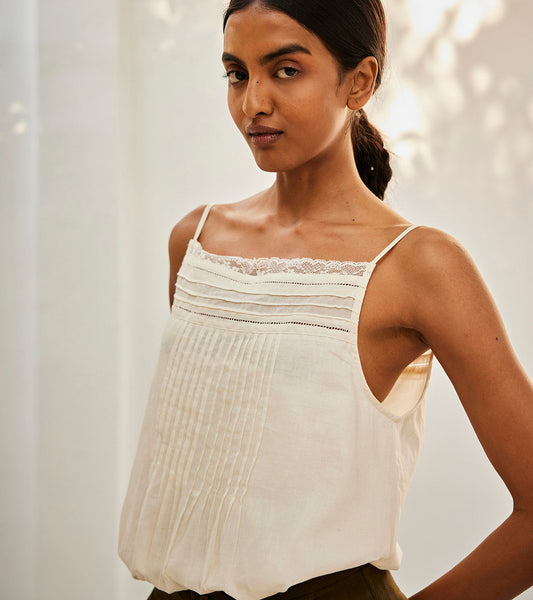 Eggshell lace blouse at Kamakhyaa by Khara Kapas. This item is Casual Wear, Mul Cotton, Off-White, Oh! Sussana Spring 2023, Organic, Regular Fit, Solids, Spaghettis, Womenswear