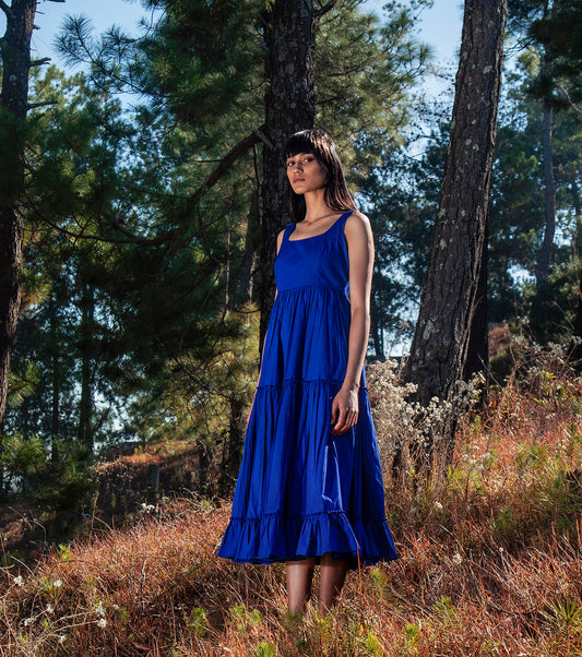 Electric Blue Midi Dress at Kamakhyaa by Khara Kapas. This item is Blue, Midi Dresses, Natural, Poplin, Regular Fit, Sleeveless Dresses, Solid Selfmade, Solids, Tiered Dresses, Wilderness, Womenswear