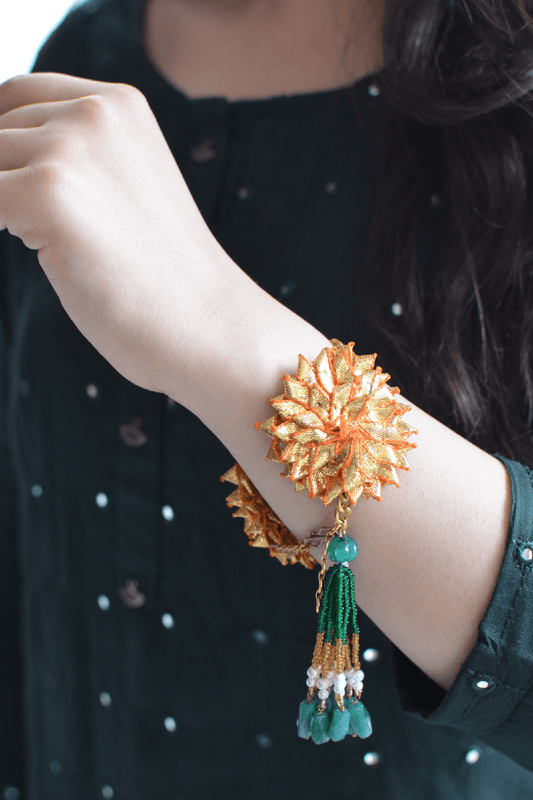 Gold Bracelet Gota Tassel at Kamakhyaa by House Of Heer. This item is Add Ons, Alloy Metal, Bracelets, Festive Jewellery, Festive Wear, Free Size, Gemstone, Gold, jewelry, July Sale, July Sale 2023, Less than $50, Natural, Pearl, Textured
