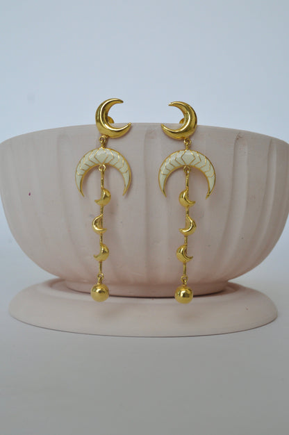 Gold Brass Luna Earrings at Kamakhyaa by The Loom Art. This item is Brass, Cosmic Dream TLA, Fashion Jewellery, Free Size, Gold, Gold Plated, jewelry, Long Earrings, Natural