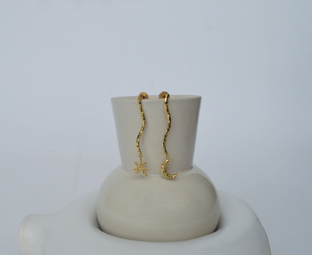 Gold Brass Moon & Star Long Earrings at Kamakhyaa by The Loom Art. This item is Brass, Cosmic Dream TLA, Fashion Jewellery, For Daughter, Free Size, Gold, Gold Plated, jewelry, Less than $50, Long Earrings, Natural