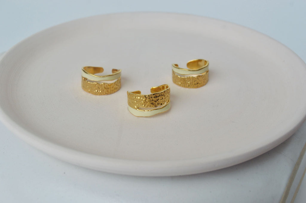 Gold Brass Pearl Enamel Stackable Rings at Kamakhyaa by The Loom Art. This item is Brass, Cosmic Dream TLA, Fashion Jewellery, For Daughter, Free Size, Gold, Gold Plated, jewelry, Less than $50, Natural, Rings, Solids, Textured
