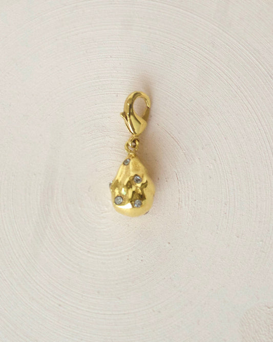 Gold Brass Studed Pearl Charm Pendants/Charm at Kamakhyaa by The Loom Art. This item is Brass, Cosmic Dream TLA, Fashion Jewellery, Free Size, Gold, Gold Plated, jewelry, Less than $50, Natural, Pendants, Products less than $25