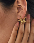 Gold Brass Tinted Star Studs at Kamakhyaa by The Loom Art. This item is Brass, Cosmic Dream TLA, Fashion Jewellery, Free Size, Gold, Gold Plated, jewelry, Less than $50, Natural, Office Wear Jewellery, Stud Earrings