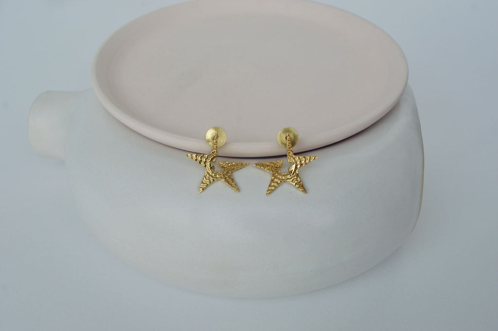 Gold Brass Tinted Star Studs at Kamakhyaa by The Loom Art. This item is Brass, Cosmic Dream TLA, Fashion Jewellery, Free Size, Gold, Gold Plated, jewelry, Less than $50, Natural, Office Wear Jewellery, Stud Earrings