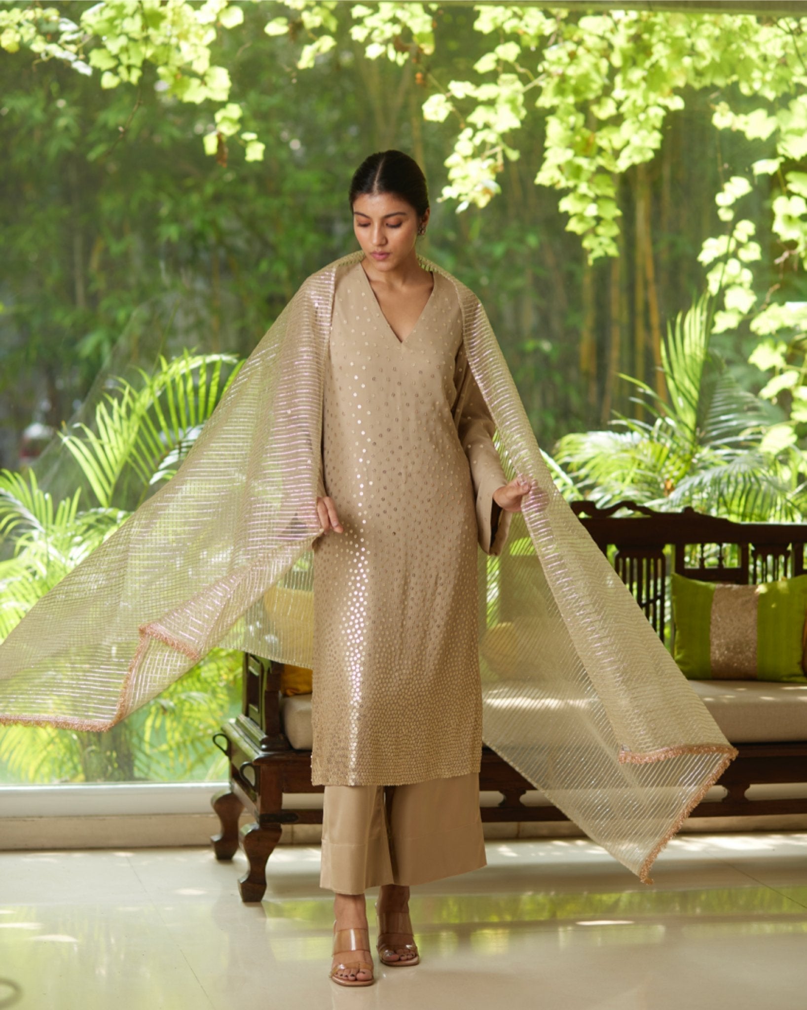 Gold Silver Satin Silk Kurta Pant Set at Kamakhyaa by Mayura Kumar. This item is Casual Wear, Festive Wear, Gold, Kurta Pant Sets, Mayura Kumar, Regular Fit, Satin, Silk, Silver, Solids, Timeless Elegance, Womenswear