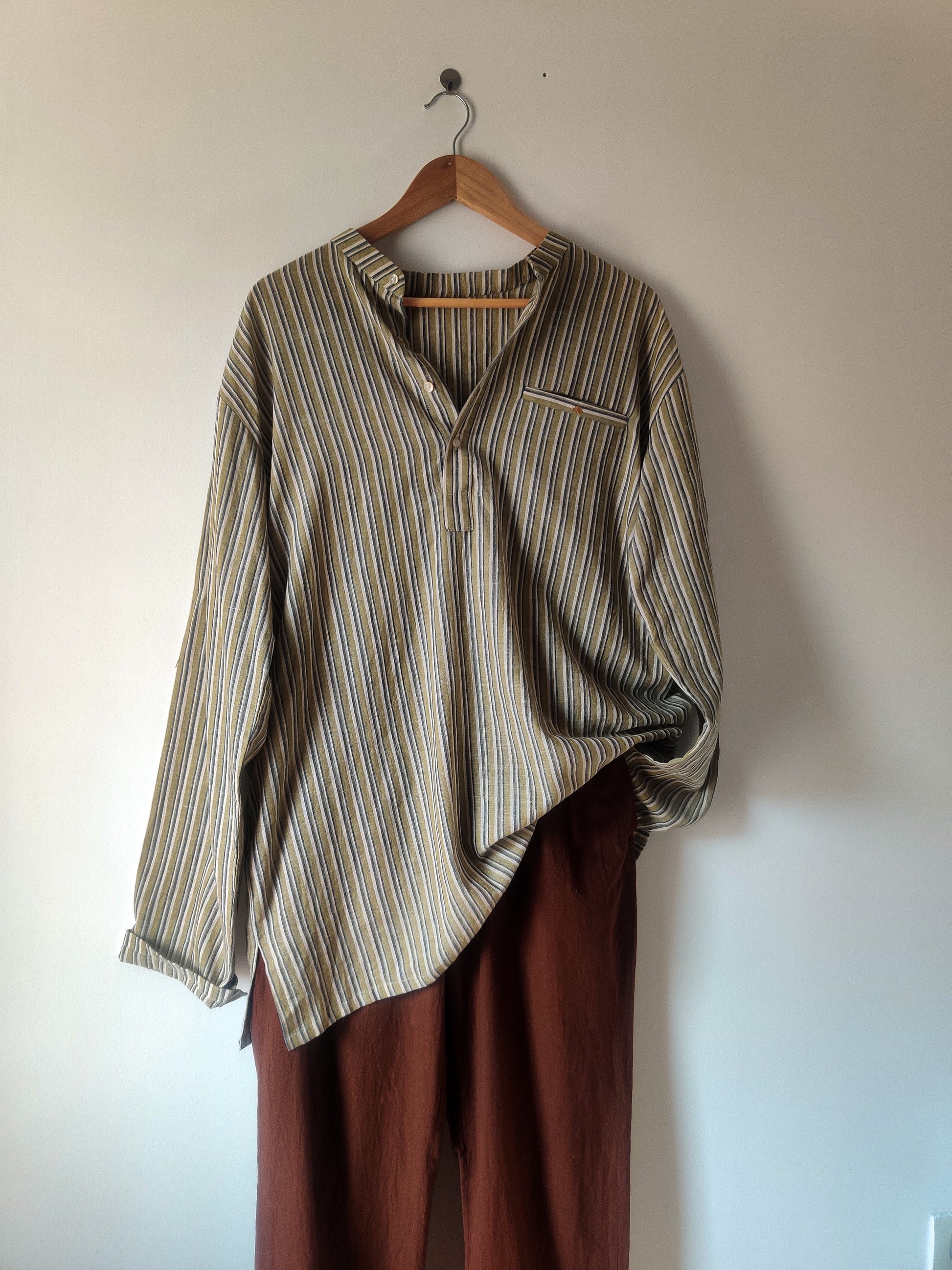 Green And Brown Cotton Kurta at Kamakhyaa by Deeta Clothing. This item is Brown, Casual Wear, Green, Handwoven Cotton, Kurtas, Menswear, Natural with azo dyes, Relaxed Fit, Shibui AW22, Stripes, Tops