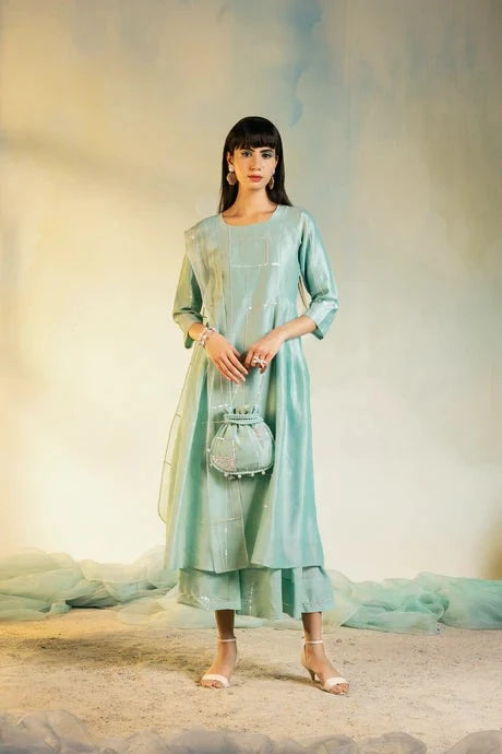 Green Cotton Kurta Set With Organza Dupatta at Kamakhyaa by Charkhee. This item is Aasmaa, Cotton, Embellished, Green, Indian Wear, Kurta Palazzo Sets, Kurta Set With Dupatta, Natural, Organza, Relaxed Fit, Sequin work, Wedding Wear, Womenswear