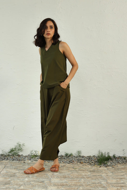 Green Cotton Poplin Sleeveless Top Bottom Co-Ord at Kamakhyaa by Canoopi. This item is Canoopi, Casual Wear, Complete Sets, Green, Natural, Poplin, Regular Fit, Solids, Vacation Co-ords, Womenswear