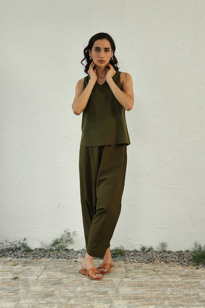 Green Cotton Poplin Sleeveless Top Bottom Co-Ord at Kamakhyaa by Canoopi. This item is Canoopi, Casual Wear, Complete Sets, Green, Natural, Poplin, Regular Fit, Solids, Vacation Co-ords, Womenswear