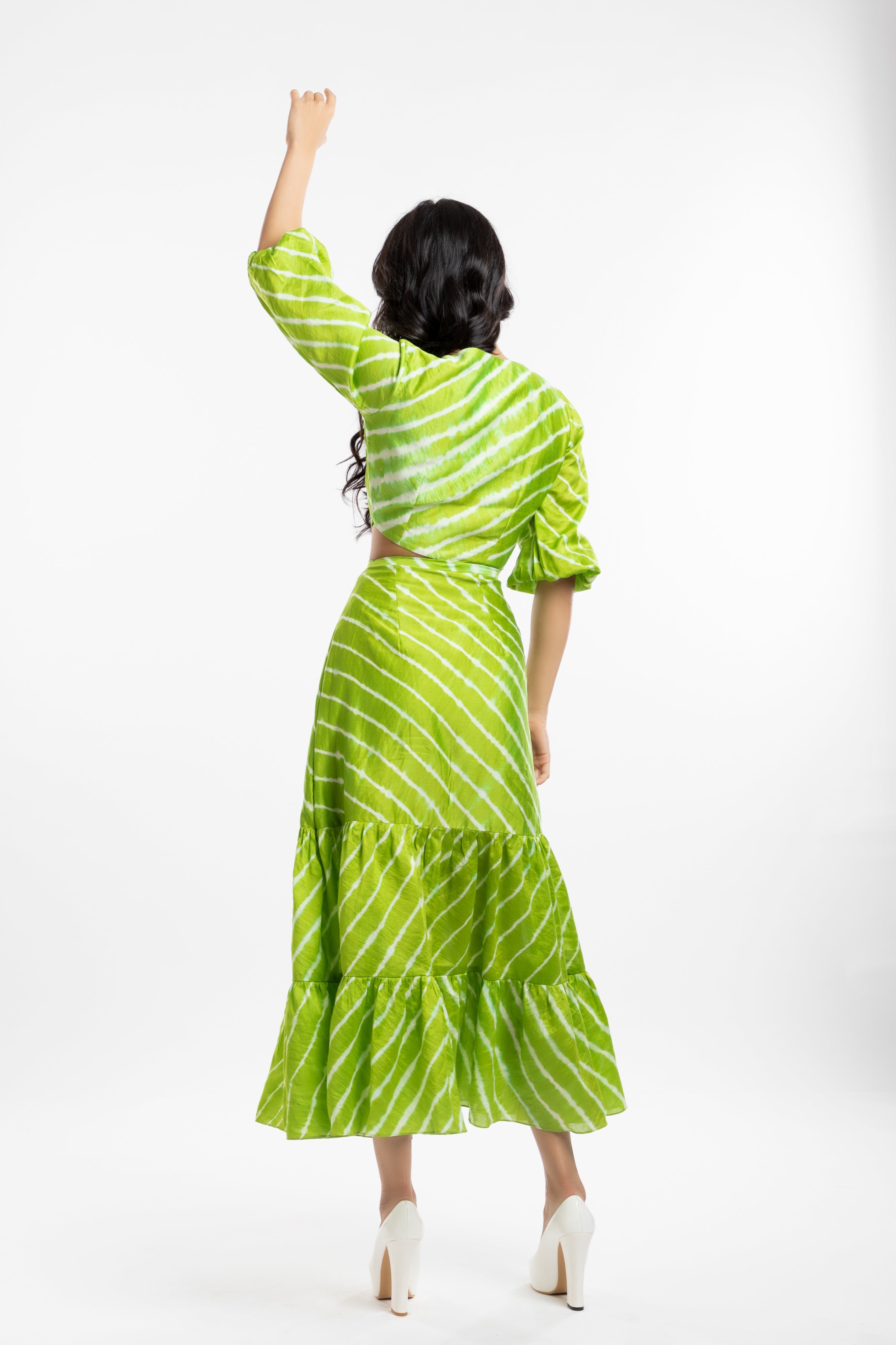 Green Cutout Dress at Kamakhyaa by House Of Ara. This item is Casual Wear, Chanderi, Cut Out Dresses, Green, Leheriya, Leheriya Collection, Maxi Dresses, Natural, Regular Fit, Silk, Stripes, Tiered Dresses, Womenswear