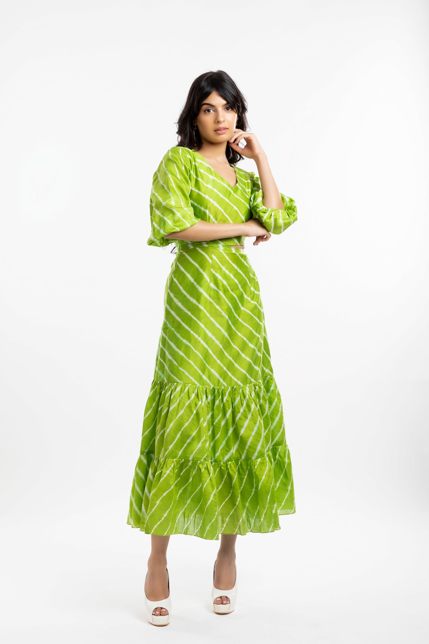 Green Cutout Dress at Kamakhyaa by House Of Ara. This item is Casual Wear, Chanderi, Cut Out Dresses, Green, Leheriya, Leheriya Collection, Maxi Dresses, Natural, Regular Fit, Silk, Stripes, Tiered Dresses, Womenswear